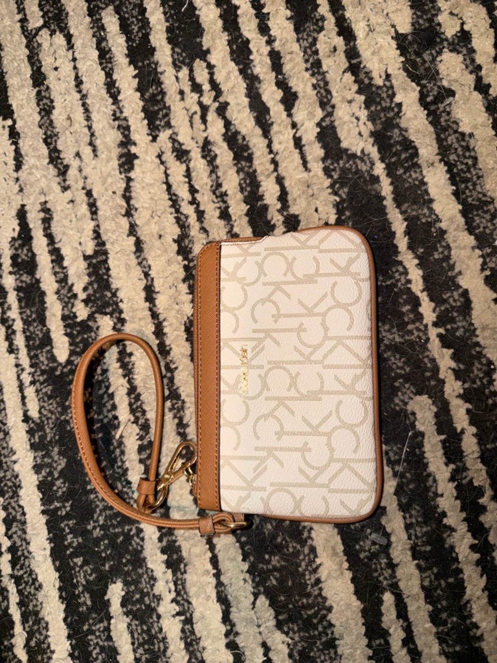 Calvin Klein Cream Logo Wristlet with Tan Blue Trim